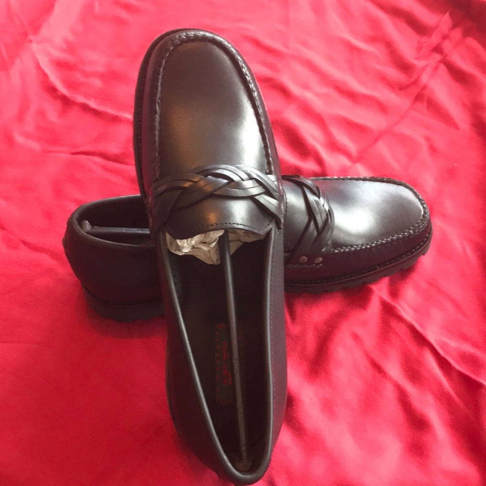 Never been worn. Rubber sole